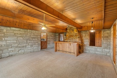 Rare opportunity on all-sports Goguac Lake! This 3-bedroom, 2 on Battle Creek Country Club in Michigan - for sale on GolfHomes.com, golf home, golf lot