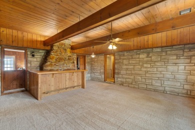 Rare opportunity on all-sports Goguac Lake! This 3-bedroom, 2 on Battle Creek Country Club in Michigan - for sale on GolfHomes.com, golf home, golf lot