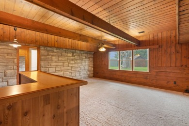 Rare opportunity on all-sports Goguac Lake! This 3-bedroom, 2 on Battle Creek Country Club in Michigan - for sale on GolfHomes.com, golf home, golf lot