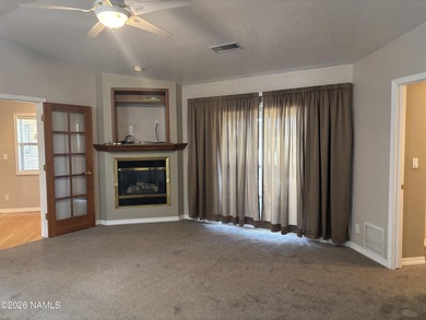 Fantastic golf course location home. Cedar siding and rock on Continental Country Club in Arizona - for sale on GolfHomes.com, golf home, golf lot