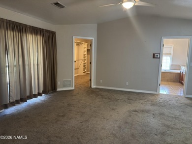 Fantastic golf course location home. Cedar siding and rock on Continental Country Club in Arizona - for sale on GolfHomes.com, golf home, golf lot