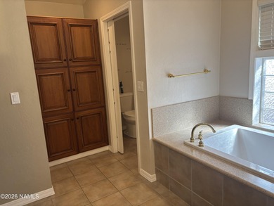 Fantastic golf course location home. Cedar siding and rock on Continental Country Club in Arizona - for sale on GolfHomes.com, golf home, golf lot