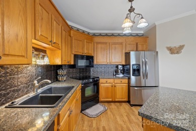 Waterfront townhouse in the sought-after community of Links of on Links O Tryon in South Carolina - for sale on GolfHomes.com, golf home, golf lot