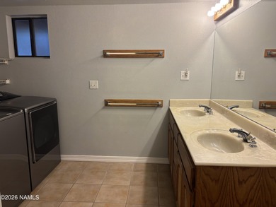 Fantastic golf course location home. Cedar siding and rock on Continental Country Club in Arizona - for sale on GolfHomes.com, golf home, golf lot