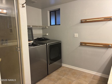 Fantastic golf course location home. Cedar siding and rock on Continental Country Club in Arizona - for sale on GolfHomes.com, golf home, golf lot