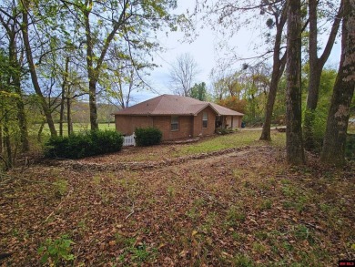 All Brick 3 bed 2 bath home backing to the old White River Golf on Rivercliff Golf Course in Arkansas - for sale on GolfHomes.com, golf home, golf lot