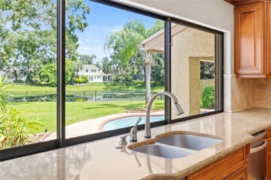 Impressive Carrollwood Village home in a beautiful a on Emerald Greens Golf Resort and Country Club in Florida - for sale on GolfHomes.com, golf home, golf lot