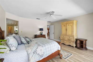 Impressive Carrollwood Village home in a beautiful a on Emerald Greens Golf Resort and Country Club in Florida - for sale on GolfHomes.com, golf home, golf lot