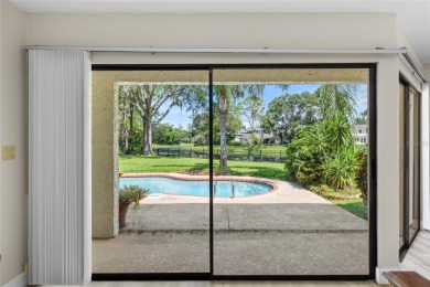 Impressive Carrollwood Village home in a beautiful a on Emerald Greens Golf Resort and Country Club in Florida - for sale on GolfHomes.com, golf home, golf lot