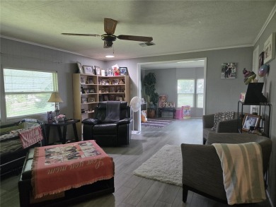 ZELLWOOD STATION 2 BEDROOM 2 BATH HOME located on a quiet on Zellwood Station Country Club in Florida - for sale on GolfHomes.com, golf home, golf lot