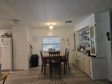 ZELLWOOD STATION 2 BEDROOM 2 BATH HOME located on a quiet on Zellwood Station Country Club in Florida - for sale on GolfHomes.com, golf home, golf lot