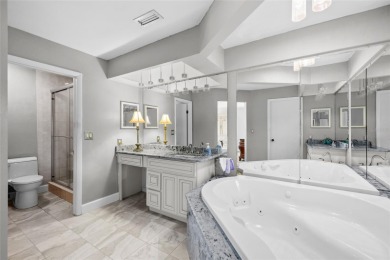 Impressive Carrollwood Village home in a beautiful a on Emerald Greens Golf Resort and Country Club in Florida - for sale on GolfHomes.com, golf home, golf lot