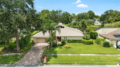 Impressive Carrollwood Village home in a beautiful a on Emerald Greens Golf Resort and Country Club in Florida - for sale on GolfHomes.com, golf home, golf lot