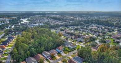 Welcome home to this two story charming home in the heart of on Golf Club At Fleming Island in Florida - for sale on GolfHomes.com, golf home, golf lot