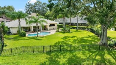 Impressive Carrollwood Village home in a beautiful a on Emerald Greens Golf Resort and Country Club in Florida - for sale on GolfHomes.com, golf home, golf lot