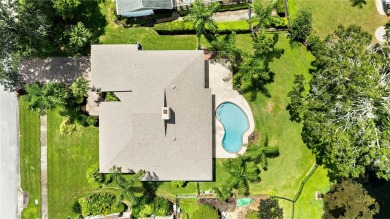 Impressive Carrollwood Village home in a beautiful a on Emerald Greens Golf Resort and Country Club in Florida - for sale on GolfHomes.com, golf home, golf lot