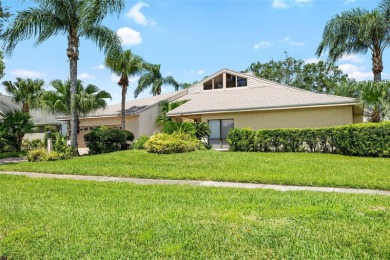 Impressive Carrollwood Village home in a beautiful a on Emerald Greens Golf Resort and Country Club in Florida - for sale on GolfHomes.com, golf home, golf lot