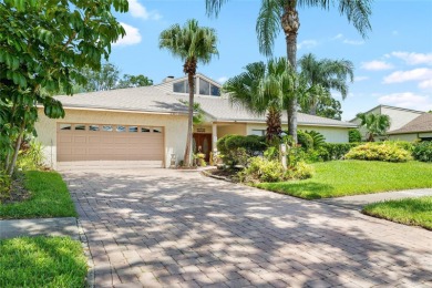 Impressive Carrollwood Village home in a beautiful a on Emerald Greens Golf Resort and Country Club in Florida - for sale on GolfHomes.com, golf home, golf lot