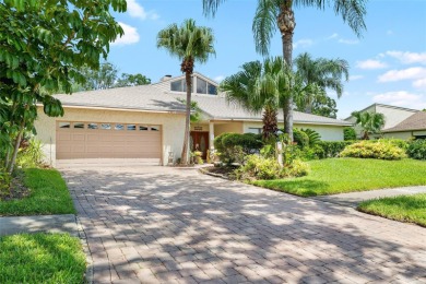 Impressive Carrollwood Village home in a beautiful a on Emerald Greens Golf Resort and Country Club in Florida - for sale on GolfHomes.com, golf home, golf lot