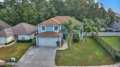 Welcome home to this two story charming home in the heart of on Golf Club At Fleming Island in Florida - for sale on GolfHomes.com, golf home, golf lot