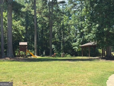 Welcome home to beautiful Woodlake Subdivision! This one-owner on Bear Creek Golf Club Inc in Georgia - for sale on GolfHomes.com, golf home, golf lot