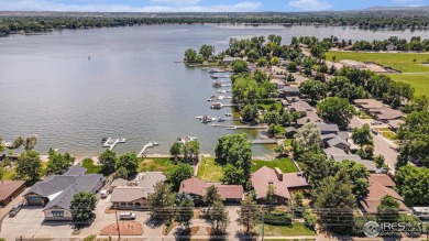 Live the Ultimate Lake Life on Gorgeous Lake Loveland! The on Cattail Creek Golf Course in Colorado - for sale on GolfHomes.com, golf home, golf lot