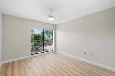 Impressive Carrollwood Village home in a beautiful a on Emerald Greens Golf Resort and Country Club in Florida - for sale on GolfHomes.com, golf home, golf lot