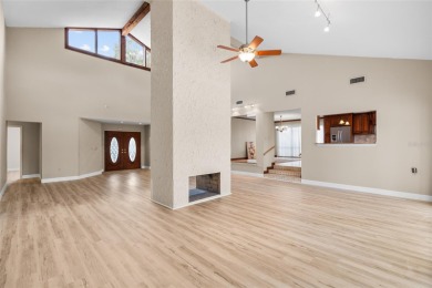 Impressive Carrollwood Village home in a beautiful a on Emerald Greens Golf Resort and Country Club in Florida - for sale on GolfHomes.com, golf home, golf lot