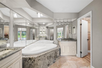 Impressive Carrollwood Village home in a beautiful a on Emerald Greens Golf Resort and Country Club in Florida - for sale on GolfHomes.com, golf home, golf lot