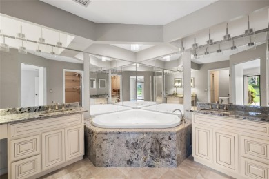 Impressive Carrollwood Village home in a beautiful a on Emerald Greens Golf Resort and Country Club in Florida - for sale on GolfHomes.com, golf home, golf lot