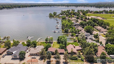 Open House Jan 17th 11-1pm & Jan 18th 11-1pm. Lake Loveland on Cattail Creek Golf Course in Colorado - for sale on GolfHomes.com, golf home, golf lot