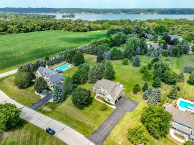 Beautifully maintained 5 BR, 2.5 BA Colonial on 1 plus acre on Western Lakes Golf Club in Wisconsin - for sale on GolfHomes.com, golf home, golf lot
