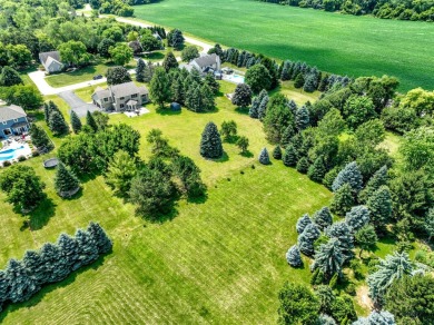 Beautifully maintained 5 BR, 2.5 BA Colonial on 1 plus acre on Western Lakes Golf Club in Wisconsin - for sale on GolfHomes.com, golf home, golf lot
