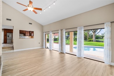 Impressive Carrollwood Village home in a beautiful a on Emerald Greens Golf Resort and Country Club in Florida - for sale on GolfHomes.com, golf home, golf lot