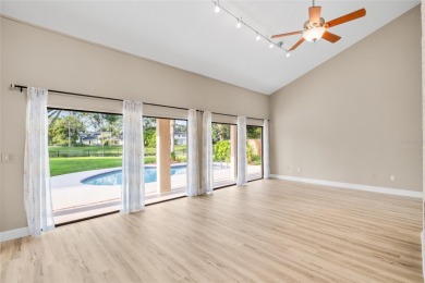 Impressive Carrollwood Village home in a beautiful a on Emerald Greens Golf Resort and Country Club in Florida - for sale on GolfHomes.com, golf home, golf lot