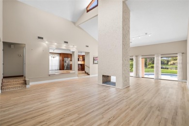 Impressive Carrollwood Village home in a beautiful a on Emerald Greens Golf Resort and Country Club in Florida - for sale on GolfHomes.com, golf home, golf lot