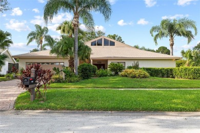 Impressive Carrollwood Village home in a beautiful a on Emerald Greens Golf Resort and Country Club in Florida - for sale on GolfHomes.com, golf home, golf lot