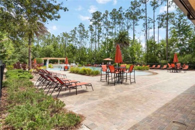 PRICE REDUCTION!! Welcome to this beautiful property in on ChampionsGate Golf Resort in Florida - for sale on GolfHomes.com, golf home, golf lot