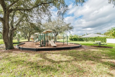 Impressive Carrollwood Village home in a beautiful a on Emerald Greens Golf Resort and Country Club in Florida - for sale on GolfHomes.com, golf home, golf lot