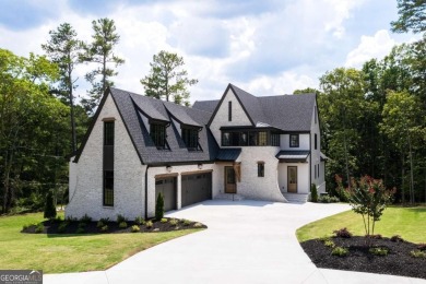 This architectural masterpiece, built by Elevation Building on The Governors Towne Club in Georgia - for sale on GolfHomes.com, golf home, golf lot