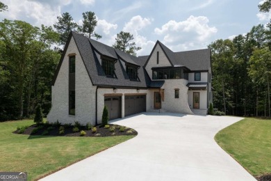 This architectural masterpiece, built by Elevation Building on The Governors Towne Club in Georgia - for sale on GolfHomes.com, golf home, golf lot