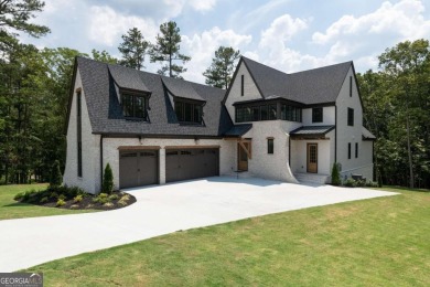 This architectural masterpiece, built by Elevation Building on The Governors Towne Club in Georgia - for sale on GolfHomes.com, golf home, golf lot