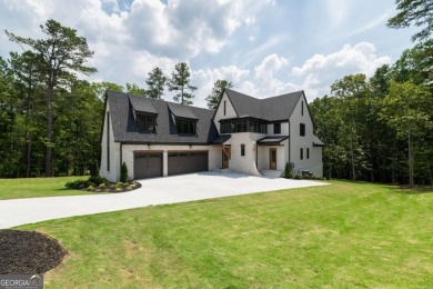 This architectural masterpiece, built by Elevation Building on The Governors Towne Club in Georgia - for sale on GolfHomes.com, golf home, golf lot