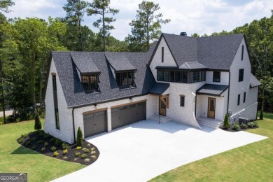 This architectural masterpiece, built by Elevation Building on The Governors Towne Club in Georgia - for sale on GolfHomes.com, golf home, golf lot