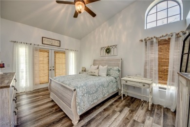 The charm of Old Florida greets you at the curb with this 3/2 on Burnt Store Golf Club in Florida - for sale on GolfHomes.com, golf home, golf lot