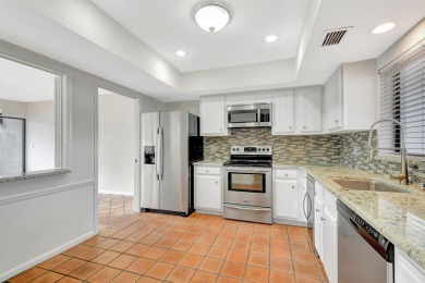 Charming 2 bedroom, 2 bathroom Villa, covered parking for 2 on The President Country Club in Florida - for sale on GolfHomes.com, golf home, golf lot