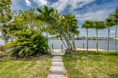 The charm of Old Florida greets you at the curb with this 3/2 on Burnt Store Golf Club in Florida - for sale on GolfHomes.com, golf home, golf lot