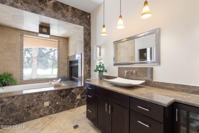 Located on the 9th Fairway in the Estate Home section of the on Halifax Plantation Golf Club in Florida - for sale on GolfHomes.com, golf home, golf lot
