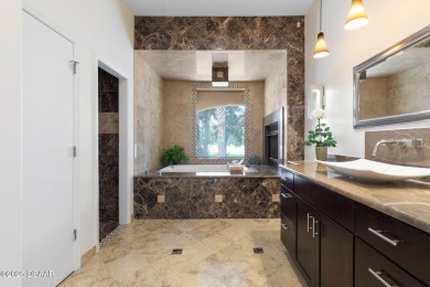 Located on the 9th Fairway in the Estate Home section of the on Halifax Plantation Golf Club in Florida - for sale on GolfHomes.com, golf home, golf lot