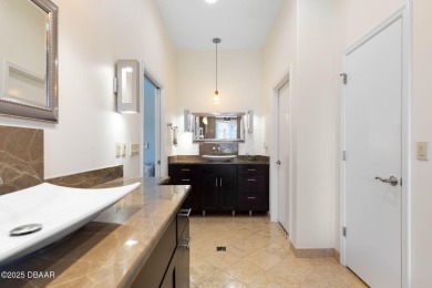 Located on the 9th Fairway in the Estate Home section of the on Halifax Plantation Golf Club in Florida - for sale on GolfHomes.com, golf home, golf lot